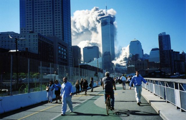 Smoke rises out of the twin towers after planes crashed into them.