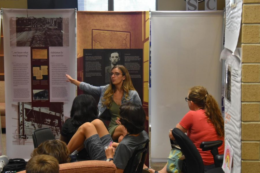 S.C. Project Director Morgan Bailey teaches students how to be docents for the Anne Frank exhibit.