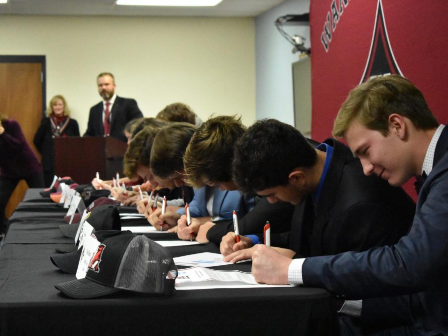 Student athletes sign to colleges on National Signing Day