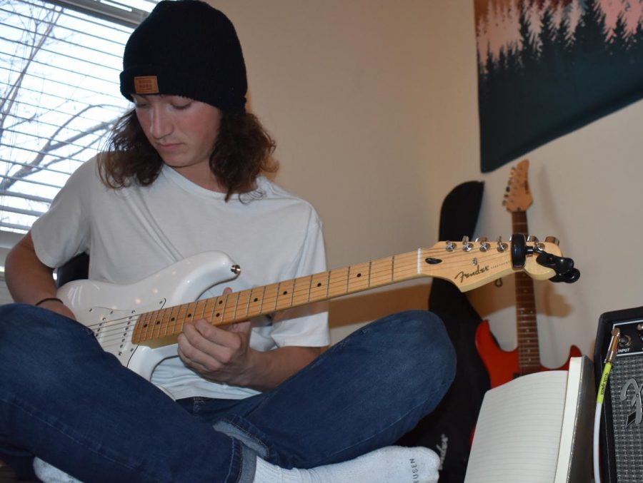 Marguglio typically plays his white Fender electric guitar in his room and has a setup with lights
and an amplifier to enhance the song that is played.