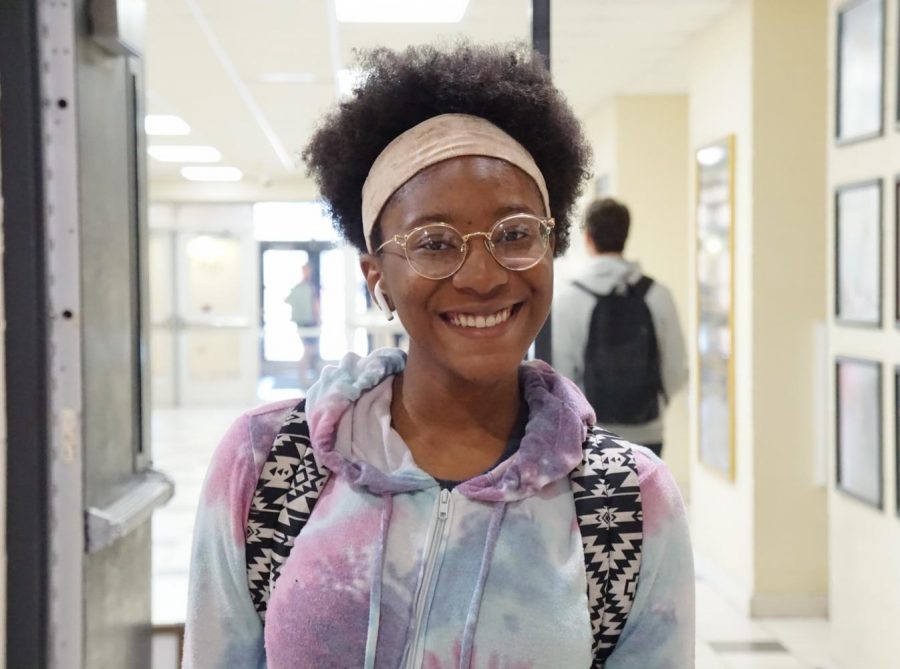 Junior LeArian Doiley smiles as she proudly wears her purple toned hoodie for Wandos Tie-Dye Day. 
