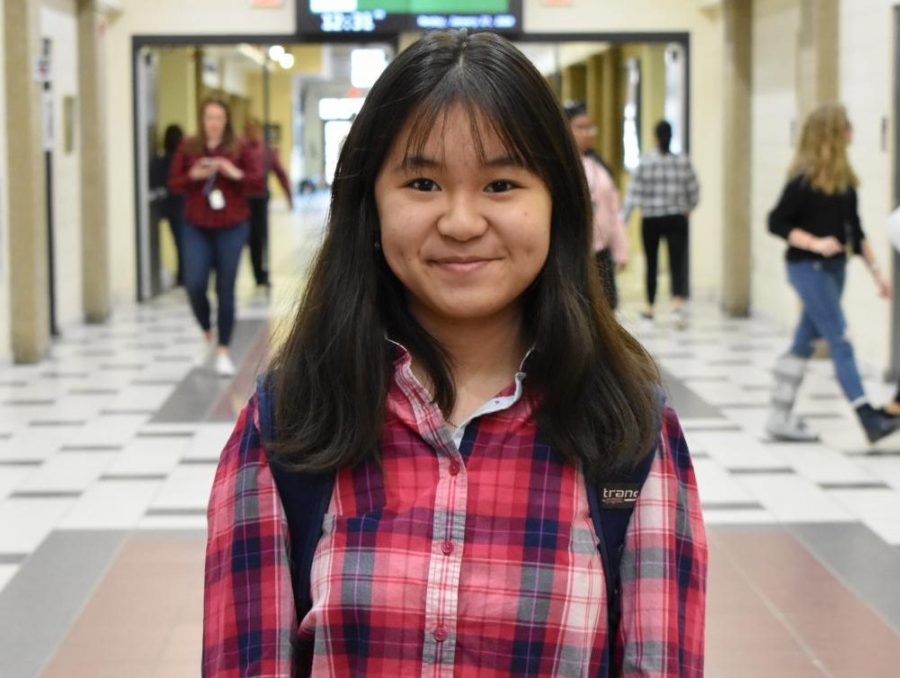 Senior Thanh Pham shows off her schools spirit with her soft red flannel for flannel day. 