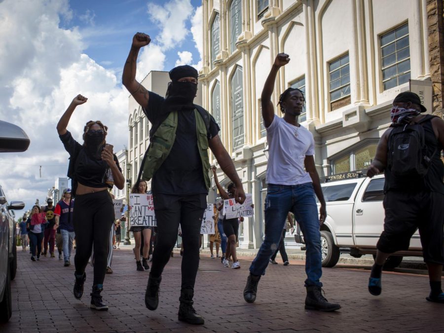 Black Lives Matter Protestors marching down King Street.
