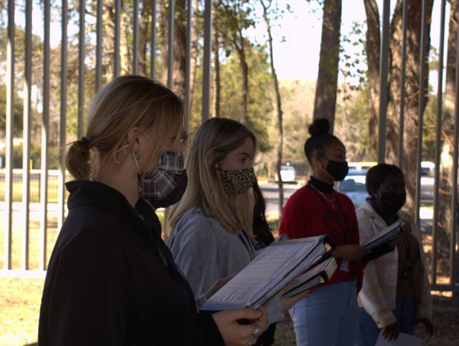 Senior Cameron Cradock practicing outside for show choir.
