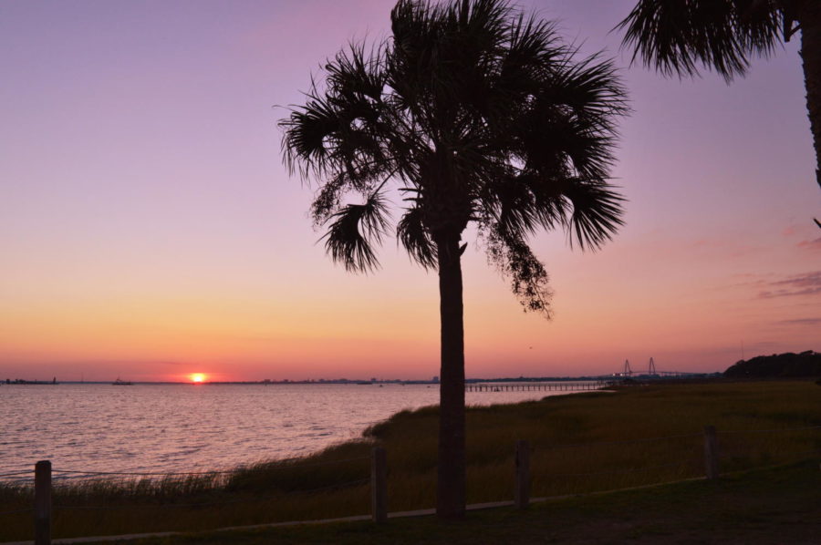 The view of one of Charlestons one of a kind sunsets seen at the Pitt Street bridge here in Mount Pleasant, featuring Charlestons famous Ravenel Bridge in the back!
