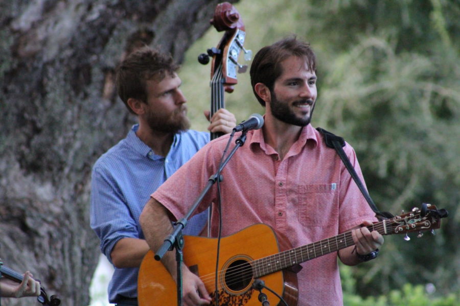 Anthony Del Porto and Mike Kavulic of The Pluff Mud String Band face the audience while playing their folk inspired music.
