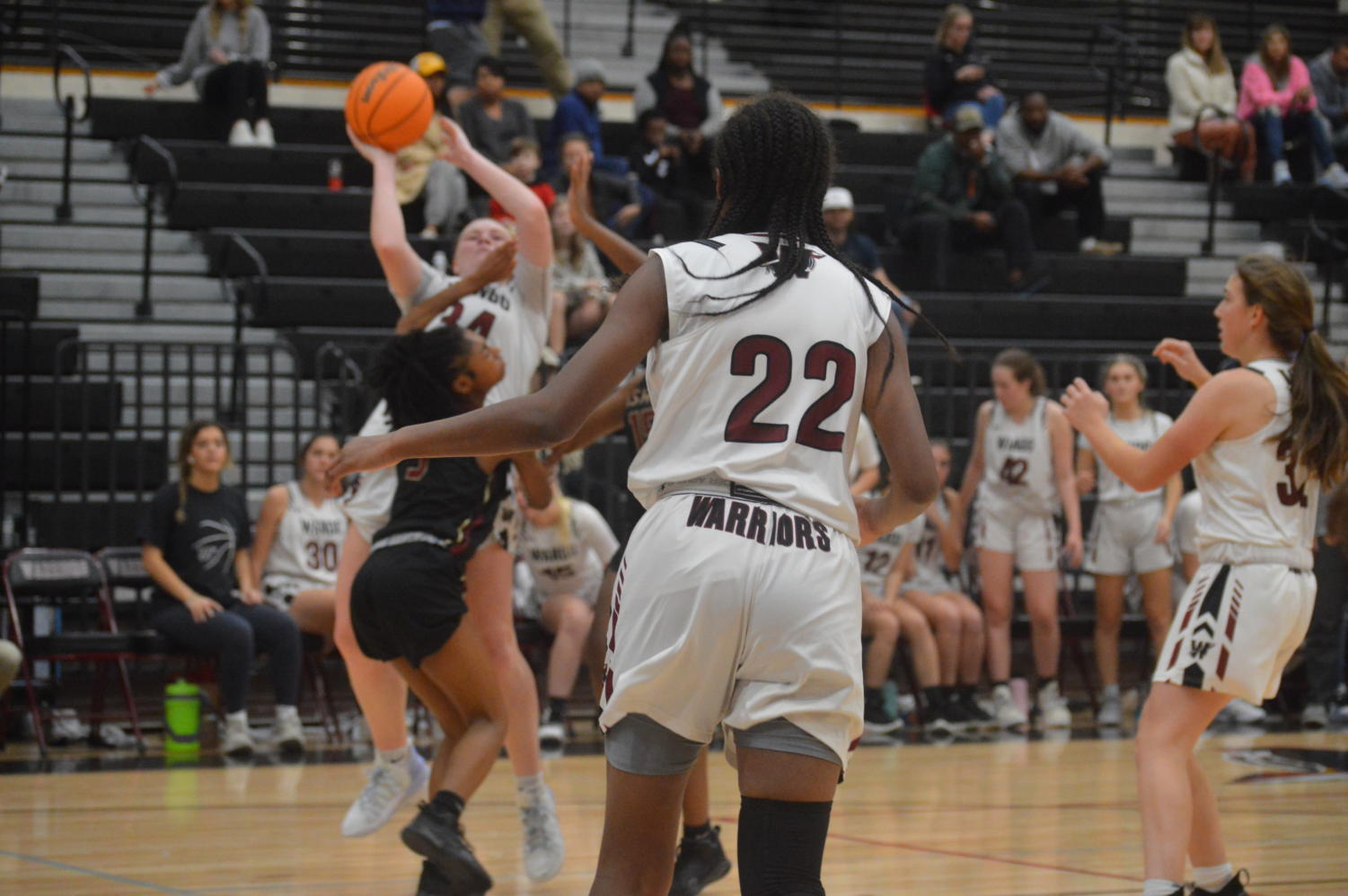 Malaya Mazyck ready for her teammate, senior Ava Curry, to pass her the ball while Currys opponent on Ashley Ridge is defending her.
