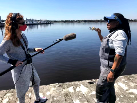Victoria Hansen interviewing a local crabber Tia Clark for a story that aired nationally on NPR.
