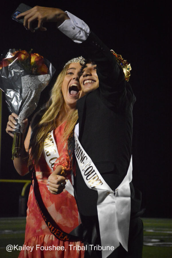 Callie Powell and Khaled Elzabidi take a selfie. After being crowned Homecoming King and Queen.