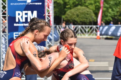 Sophomore Campbell Cason and Sullivan Ham catch their breath with a teammater after a triathlon competition