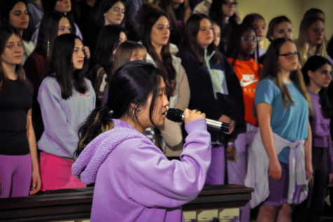 Junior Viona Su is a soloist in the Wando Christmas concert. She sings a Christmas hymn with great joy as her fellow choir mates occasionally chime in.