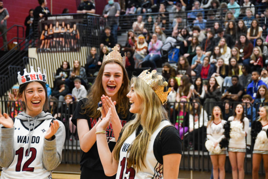 Senior Tess Parker waves to the crowd.