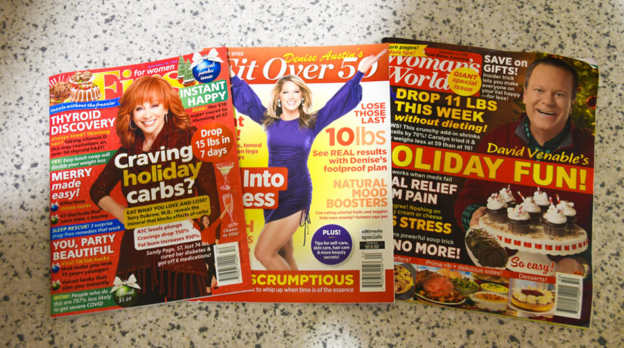 Popular magazines displayed on store shelves promote unhealthy dieting. These covers promote weight loss after holidays.