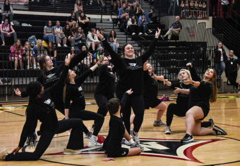 Wando Color guard performs their routine and ends the dance by highlighting Senior Ryleigh Champion.