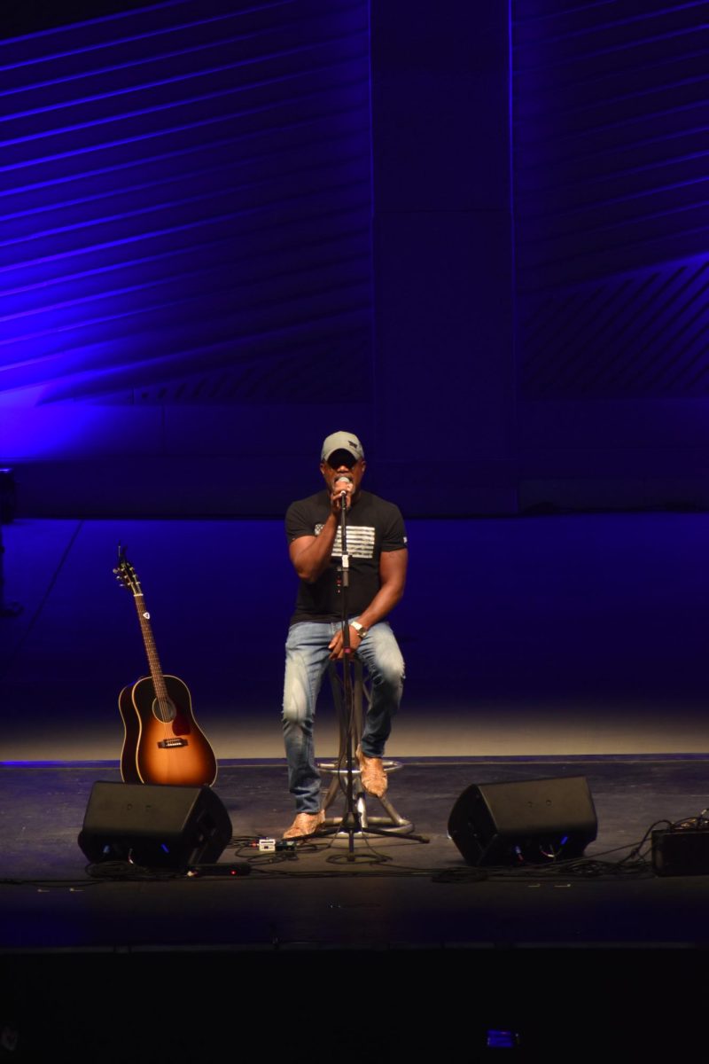 Darius Rucker takes the stage and performs for the crowd. 