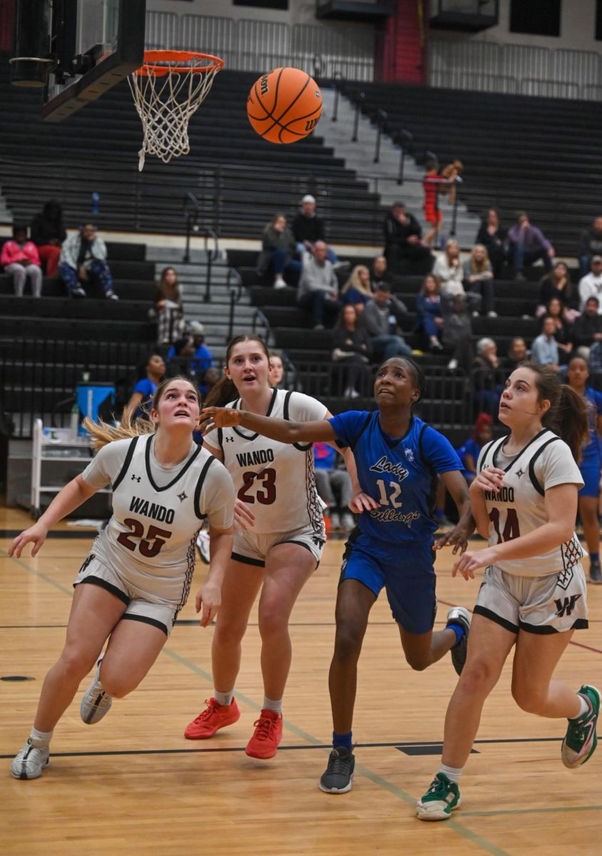 Varsity girls basketball victory vs. Burke