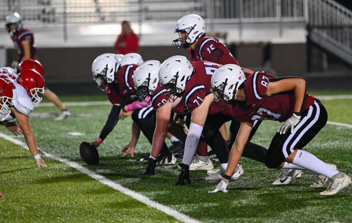 Quarterback Oliver Todd gets ready to snap the ball vs. Stratford.