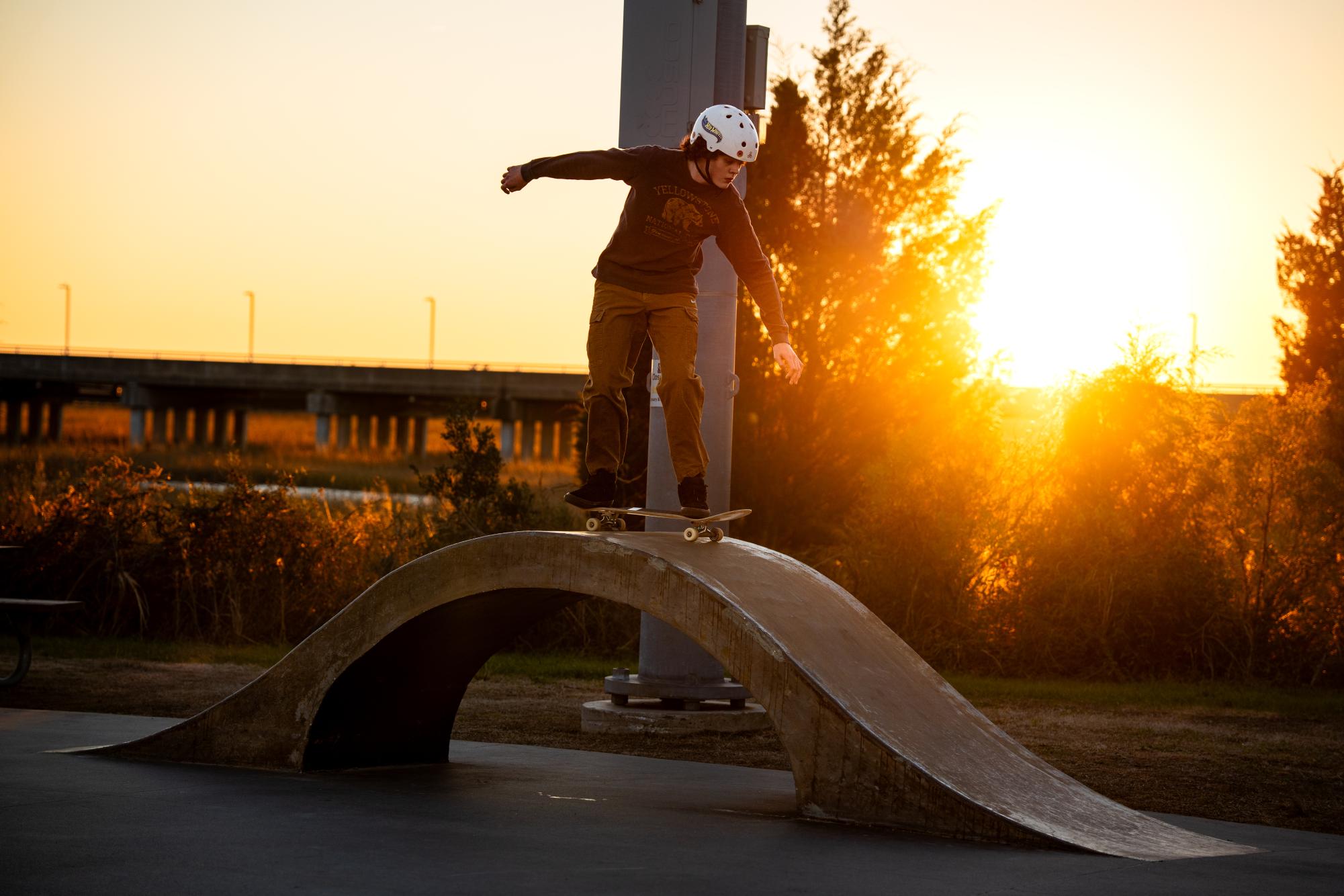 Senior Hewitt Durand flies over the arch at Sk8 Charleston in the last trick of the day.