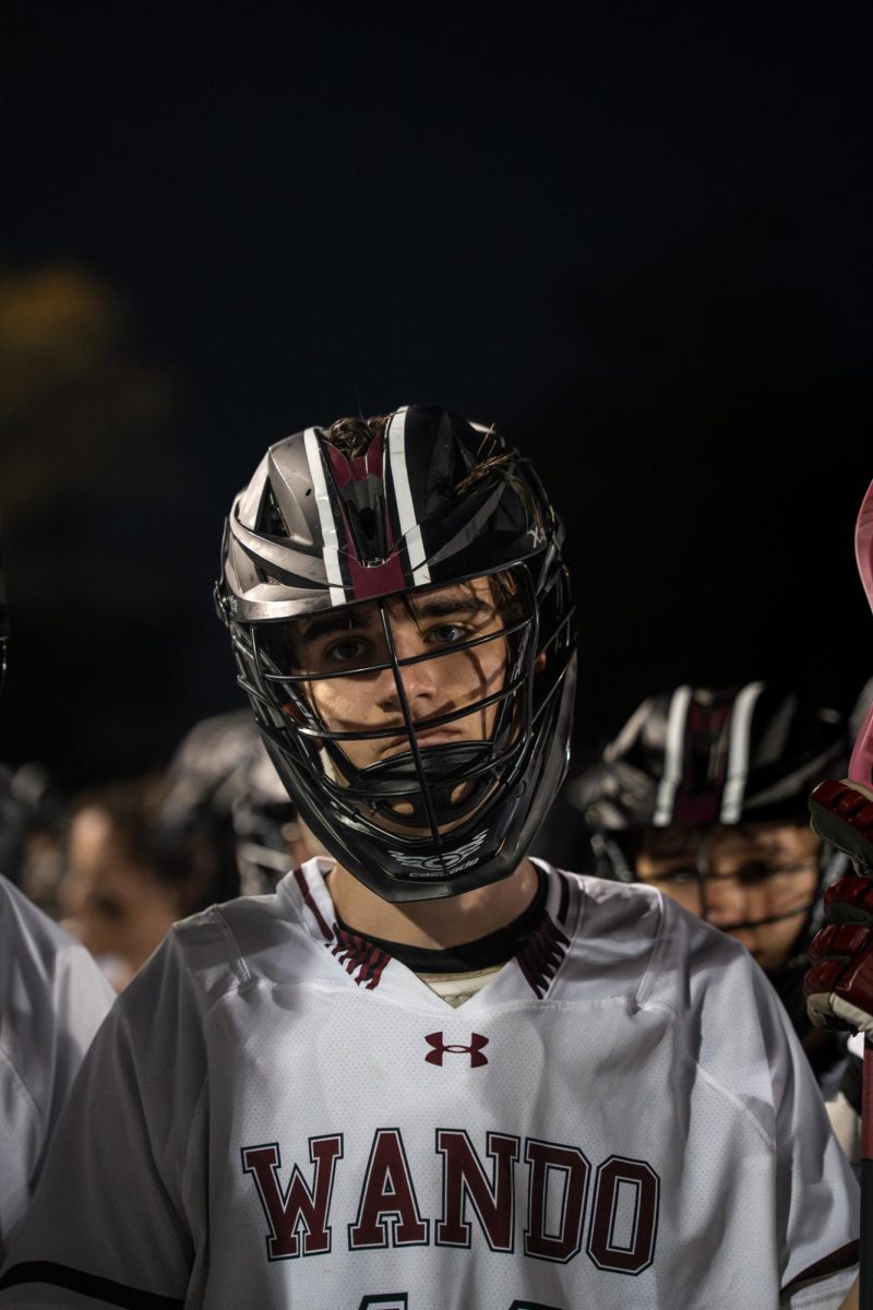 Sophomore John Thorne sighs in despair after the devastating heartbreaker loss in overtime. 