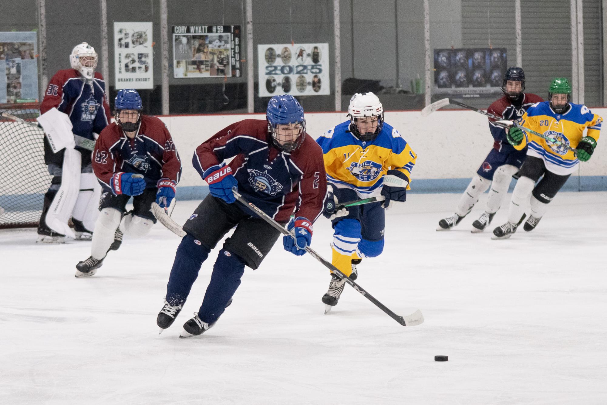 Sophomore Mateo Russo races against
the opposing team to make a shot on the goal. The Junior Stingrays have scored a total of 49 goals throughout the season according to ECHL.