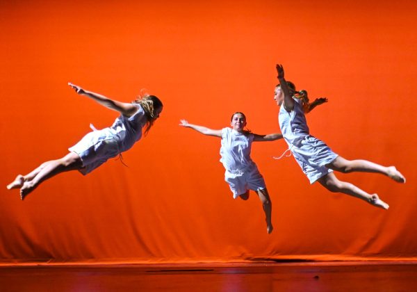 Sophomore Ksenija Lavrinovica, junior Kaylyn Elder, and sophomore Gianna leaped into the air on stage in perfect timing. 