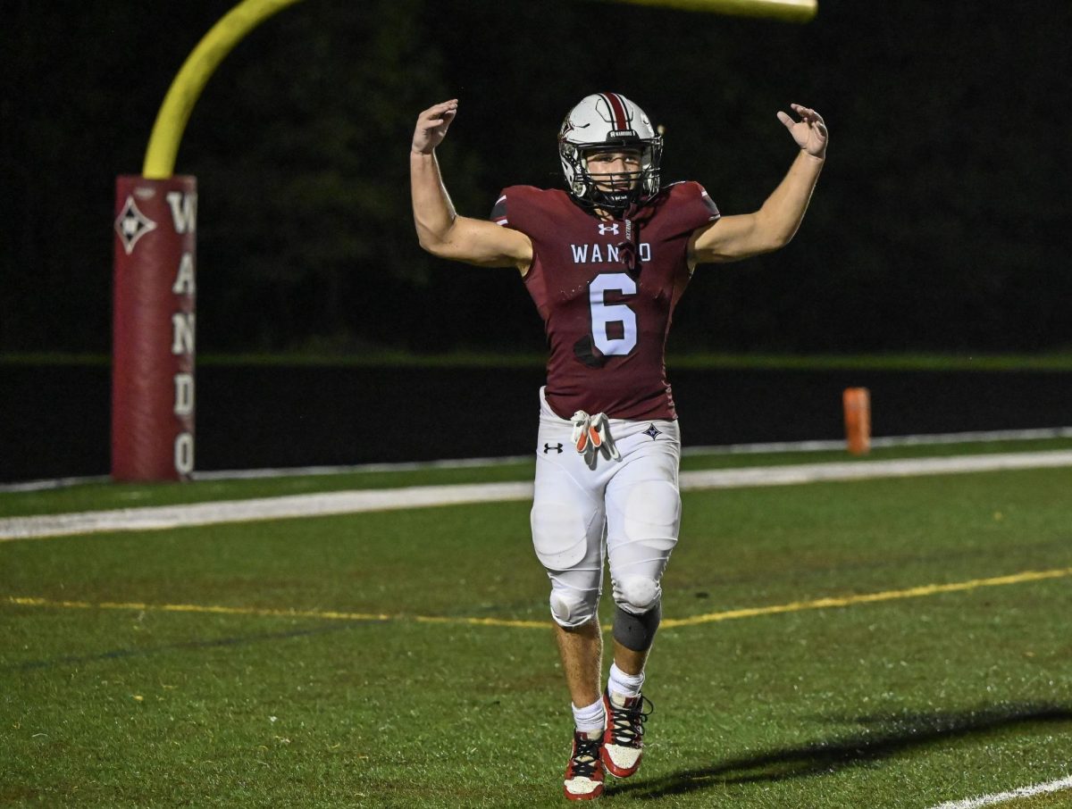 Junior Running Back Jake Glassberg celebrating the Warriors performance.