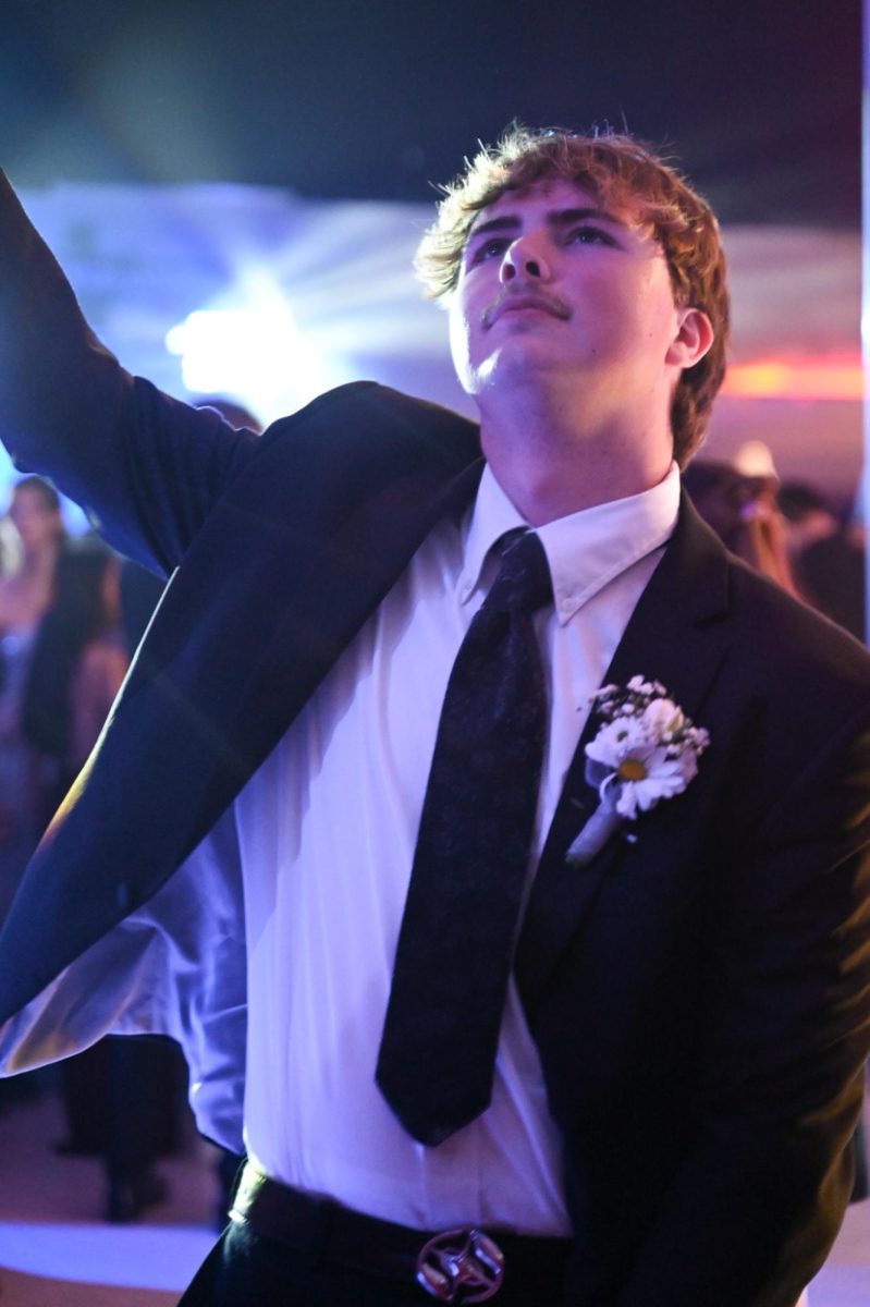 Senior Fisher Bond gets lost in the music.