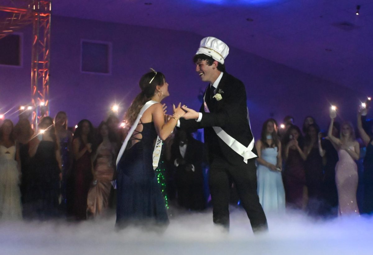 Senior Brody Mancusi shares a dance with his girlfriend, senior Ruth Lee, after they won prom king and queen. "It was pretty surreal, but it was really cool to just hear my name and have all my friends cheer and be happy for me," Mancusi said.