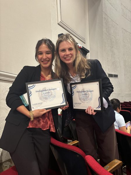 Seniors Nyssa Kuonen and Svetlana Reznikova hold the awards they won at the Model United Nations competition. "I think it's really interesting to step into the shoes of other countries in perspective ... even though it's just in a mock setting," Kuonen said.
Photo provided // Nyssa Kuonen.